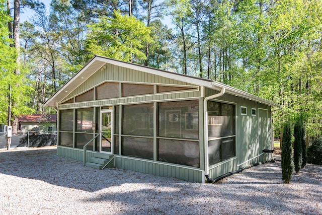 142 Blackhawk Dr, Louisburg, NC 27549 - view of side of property featuring a sunroom