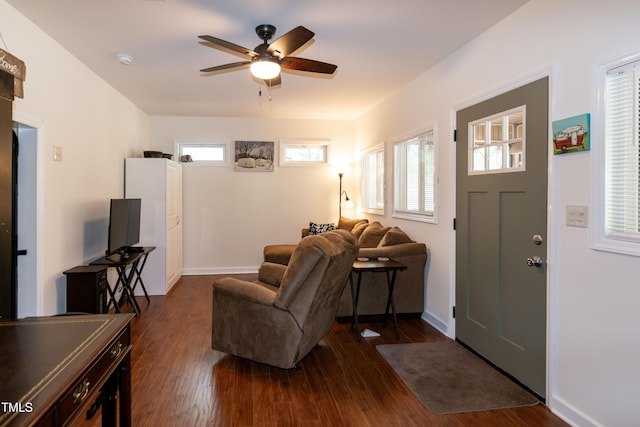 142 Blackhawk Dr, Louisburg, NC 27549 - living area with dark wood-type flooring, ceiling fan, and baseboards