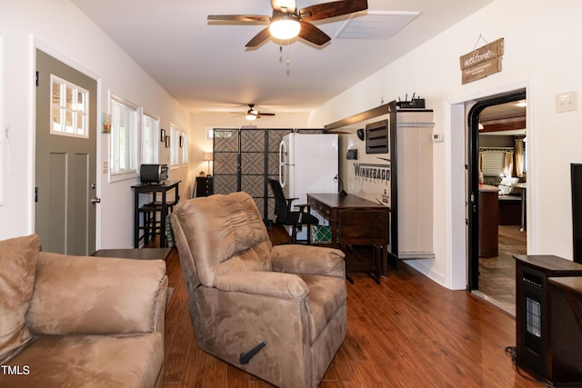 142 Blackhawk Dr, Louisburg, NC 27549 - living area featuring wood finished floors, ceiling fan, and visible vents