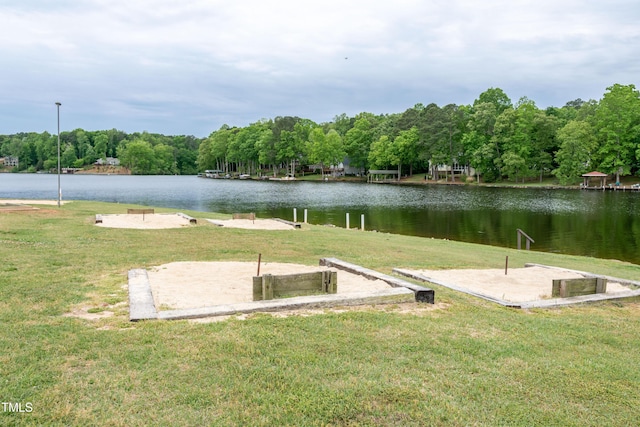 142 Blackhawk Dr, Louisburg, NC 27549 - dock area with a water view, a forest view, and a lawn