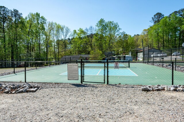 142 Blackhawk Dr, Louisburg, NC 27549 - view of tennis court with fence and a gate