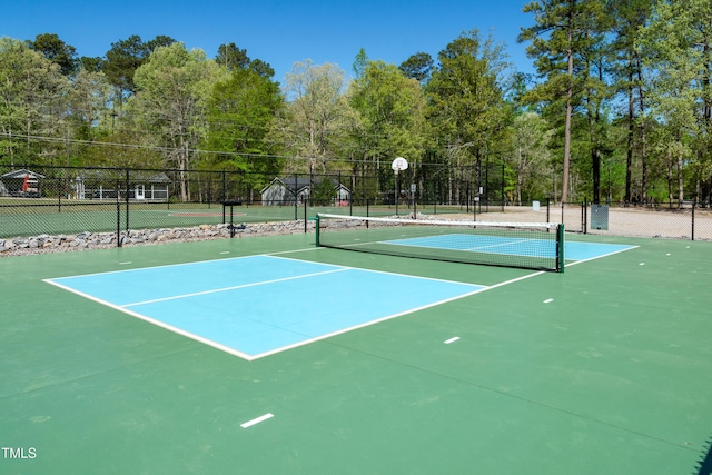 142 Blackhawk Dr, Louisburg, NC 27549 - view of tennis court featuring community basketball court and fence