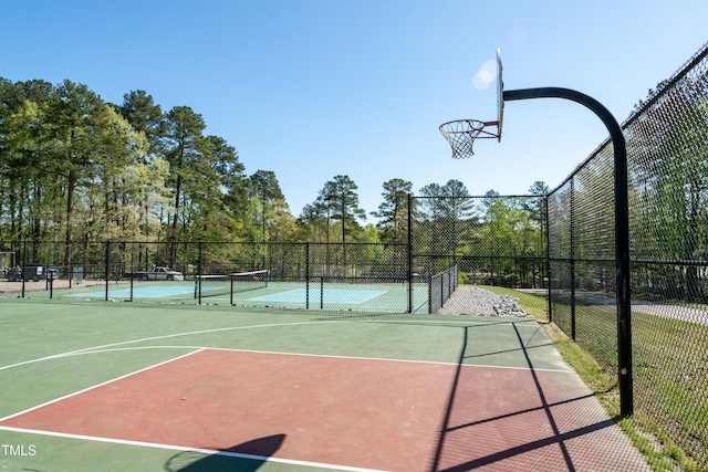 142 Blackhawk Dr, Louisburg, NC 27549 - view of sport court featuring a tennis court and fence
