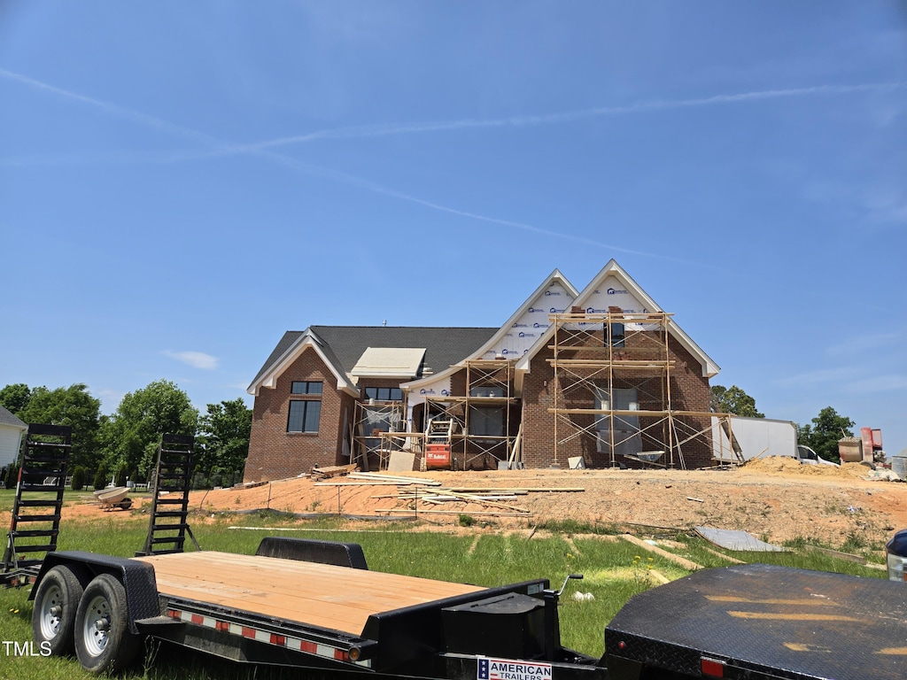 154 Bellini Dr, Clayton, NC 27527 - back of house with brick siding