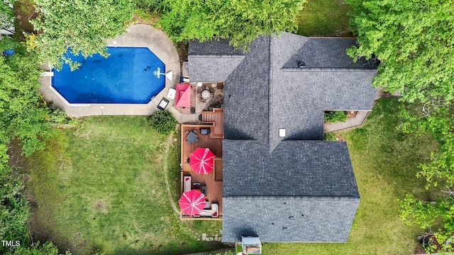 view of subject property featuring a pool
