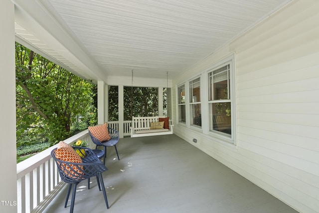 view of patio featuring a porch