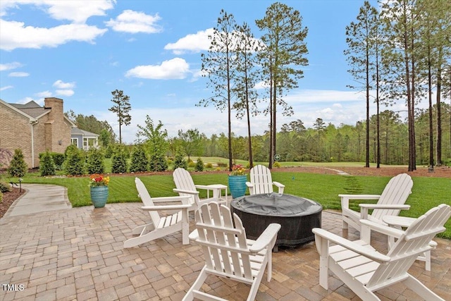749 Golfers Vw, Pittsboro, NC 27312 - view of patio / terrace with a fire pit