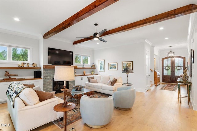 749 Golfers Vw, Pittsboro, NC 27312 - living room with french doors, light wood-type flooring, ornamental molding, and beam ceiling