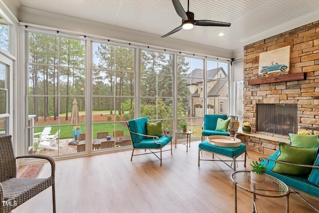 749 Golfers Vw, Pittsboro, NC 27312 - sunroom with a stone fireplace and ceiling fan