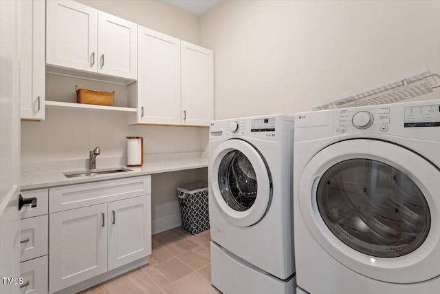 749 Golfers Vw, Pittsboro, NC 27312 - clothes washing area with independent washer and dryer, a sink, and cabinet space