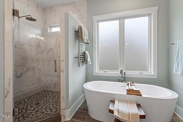 749 Golfers Vw, Pittsboro, NC 27312 - bathroom featuring a marble finish shower, baseboards, a freestanding tub, and wood tiled floor