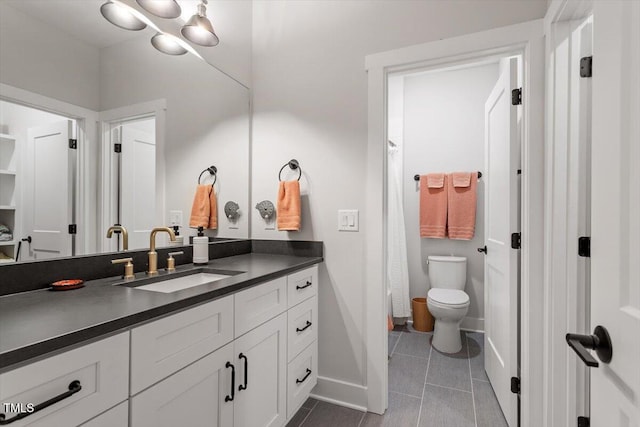 749 Golfers Vw, Pittsboro, NC 27312 - bathroom with vanity, baseboards, curtained shower, tile patterned floors, and toilet
