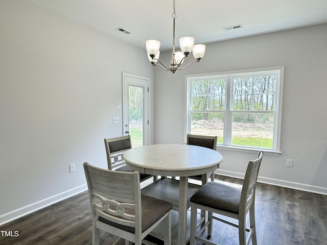 1387 Stoney Creek Church Rd, Goldsboro, NC 27534 - dining space with an inviting chandelier, plenty of natural light, and visible vents