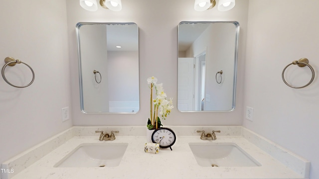 1387 Stoney Creek Church Rd, Goldsboro, NC 27534 - bathroom featuring a sink and double vanity