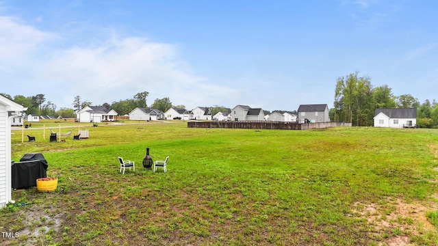 295 Springtooth Dr, Zebulon, NC 27597 - view of yard with fence and a residential view