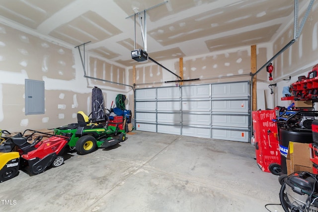 295 Springtooth Dr, Zebulon, NC 27597 - garage with a garage door opener and electric panel
