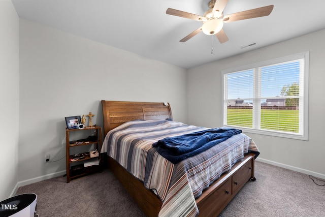 295 Springtooth Dr, Zebulon, NC 27597 - bedroom featuring baseboards, a ceiling fan, and carpet