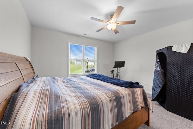 295 Springtooth Dr, Zebulon, NC 27597 - carpeted bedroom with visible vents, baseboards, and a ceiling fan