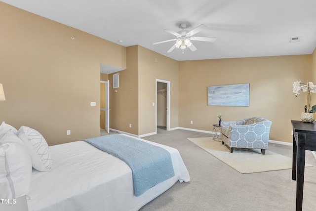 bedroom featuring visible vents, baseboards, carpet flooring, and vaulted ceiling