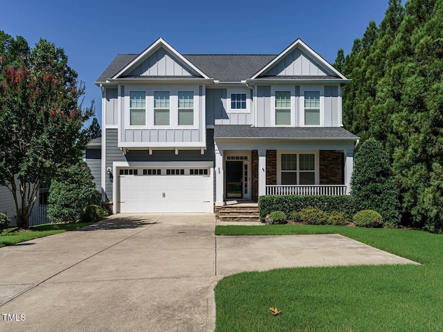 65 N Wilders Ridge Way, Clayton, NC 27527 - craftsman-style house featuring board and batten siding, a porch, driveway, and an attached garage