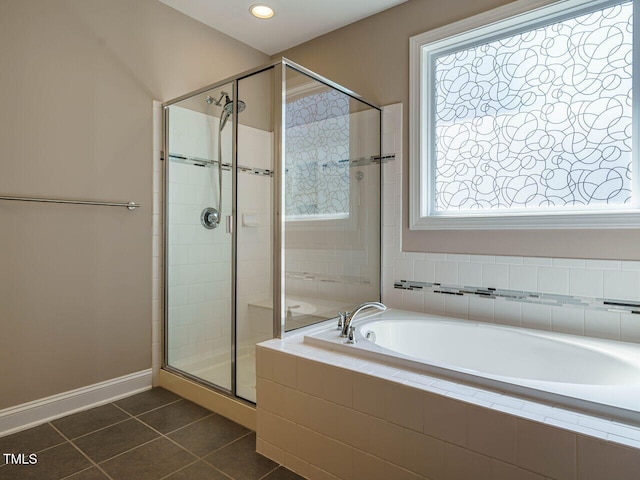 65 N Wilders Ridge Way, Clayton, NC 27527 - bathroom featuring tile patterned floors, a bath, a stall shower, and recessed lighting
