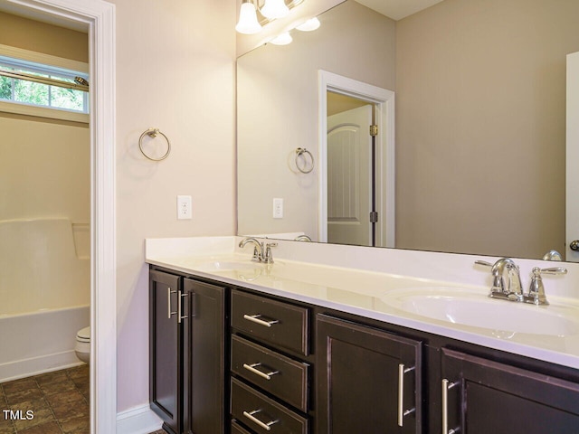 65 N Wilders Ridge Way, Clayton, NC 27527 - bathroom with double vanity and toilet