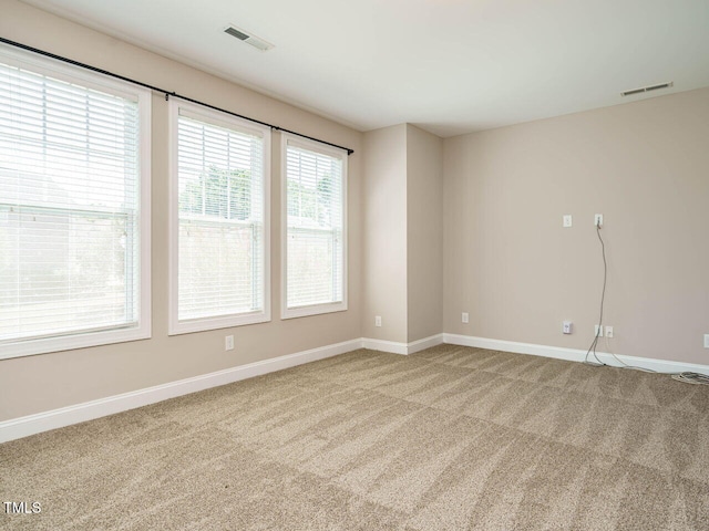 65 N Wilders Ridge Way, Clayton, NC 27527 - spare room featuring carpet flooring and baseboards