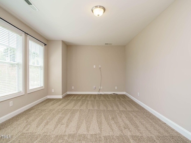 65 N Wilders Ridge Way, Clayton, NC 27527 - unfurnished room with light colored carpet and baseboards