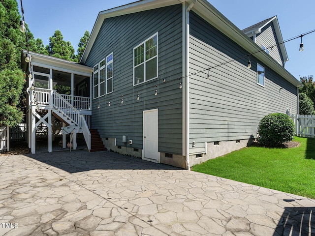 65 N Wilders Ridge Way, Clayton, NC 27527 - back of house with crawl space, a patio, a sunroom, and stairway