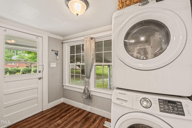 2815 Orange Grove Rd, Hillsborough, NC 27278 - laundry area with stacked washer and clothes dryer, baseboards, dark wood-style flooring, and ornamental molding