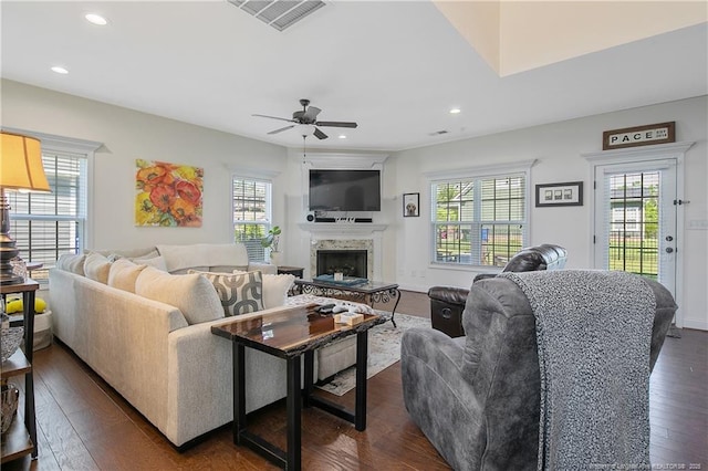 living room with ceiling fan, recessed lighting, visible vents, and dark wood-style flooring