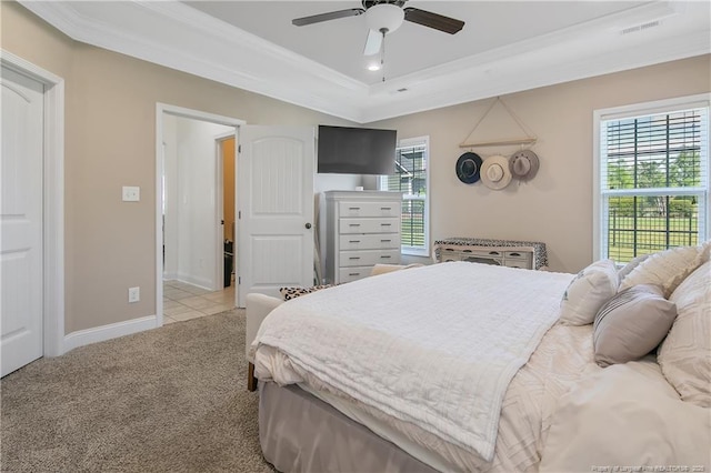 bedroom with ornamental molding, carpet flooring, multiple windows, and visible vents