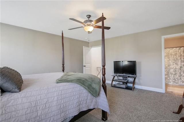carpeted bedroom featuring baseboards and ceiling fan