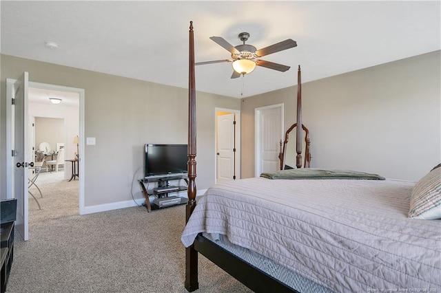 bedroom featuring baseboards, a ceiling fan, and carpet