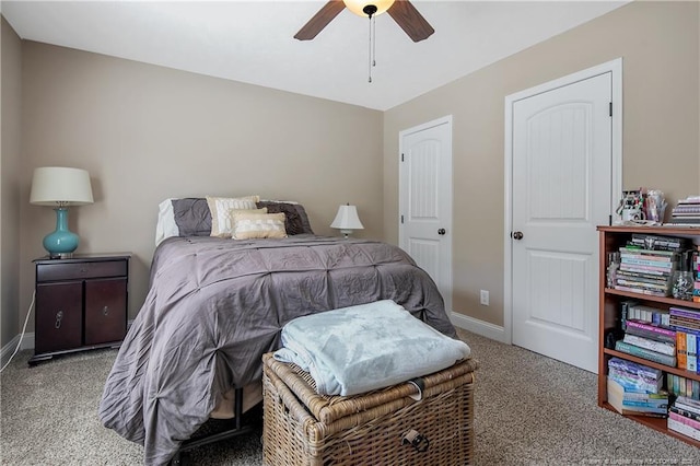 bedroom featuring carpet floors, baseboards, and a ceiling fan