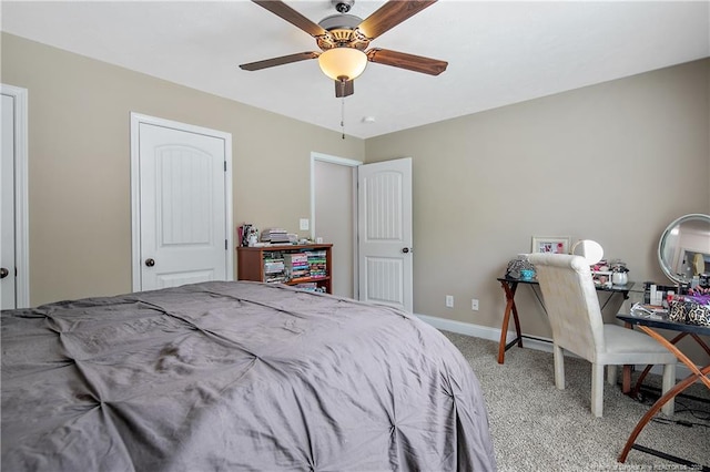 bedroom featuring baseboards, a ceiling fan, and carpet floors