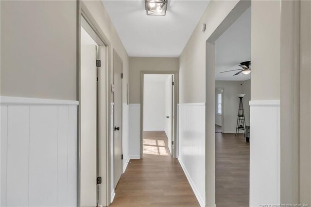 7517 Seaton Pl, Fayetteville, NC 28303 - corridor featuring light wood-style floors and wainscoting