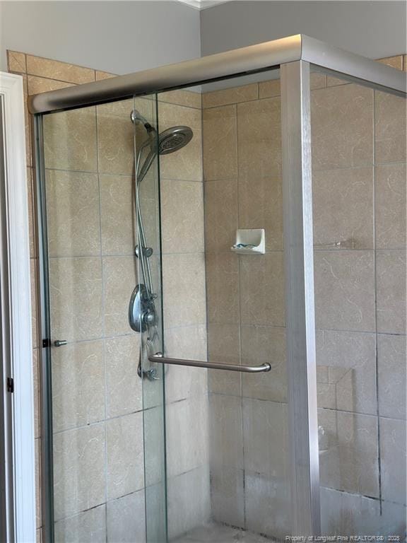 bathroom featuring a stall shower