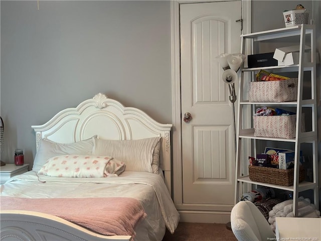 bedroom featuring carpet
