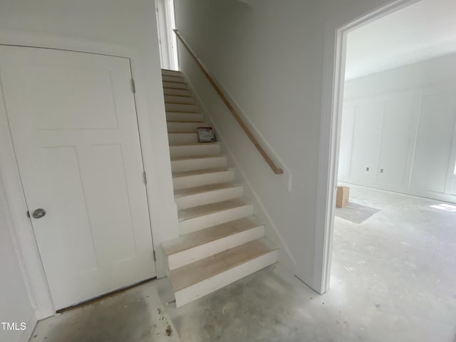 102 Rae Dr, Pikeville, NC 27863 - staircase with concrete flooring
