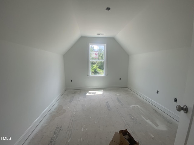 102 Rae Dr, Pikeville, NC 27863 - bonus room featuring lofted ceiling and baseboards