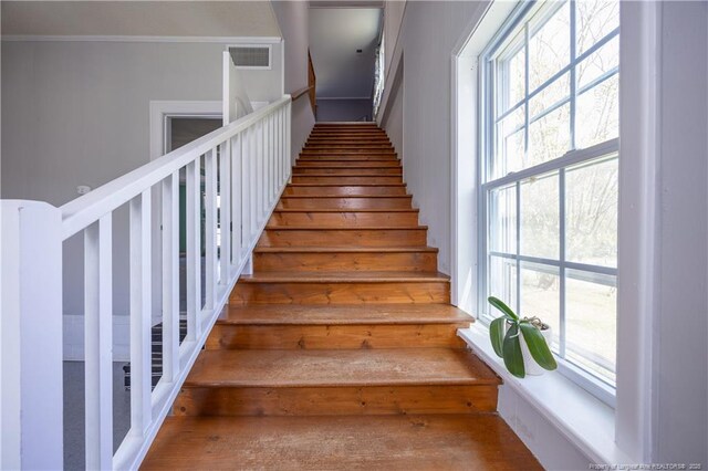 211 Edgewood Ave, Clinton, NC 28328 - staircase with ornamental molding and visible vents