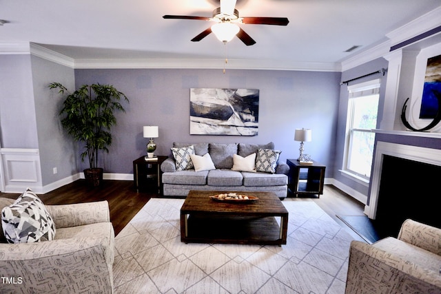126 Willow Weald Ct, Fuquay Varina, NC 27526 - living room with a ceiling fan, wood finished floors, crown molding, and baseboards