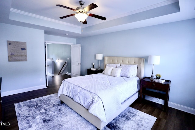 126 Willow Weald Ct, Fuquay Varina, NC 27526 - bedroom with a tray ceiling, crown molding, wood finished floors, baseboards, and a ceiling fan