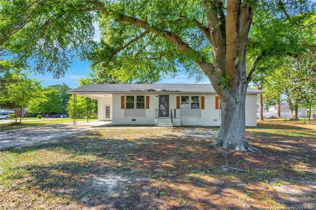 3014 Akron Dr, Hope Mills, NC 28348 - ranch-style home featuring a carport, crawl space, and concrete driveway