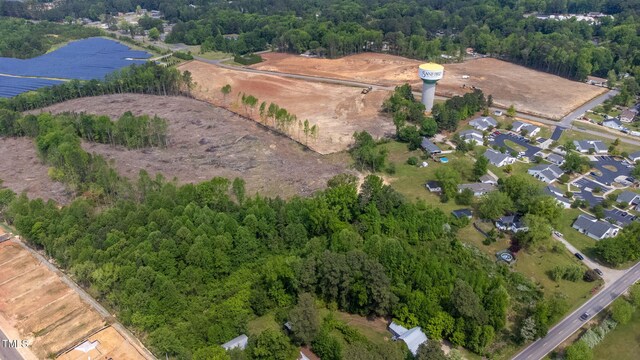 2102 Courtland Dr, Sanford, NC 27330 - aerial view featuring a forest view