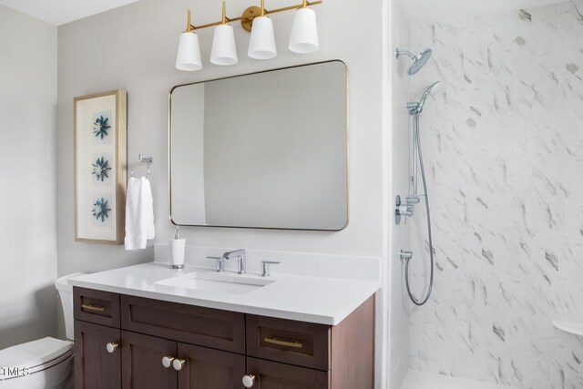 123 Trellingwood Dr, Morrisville, NC 27560 - bathroom with vanity, a marble finish shower, and toilet