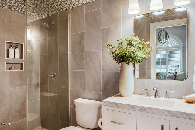 123 Trellingwood Dr, Morrisville, NC 27560 - full bath featuring toilet, tile walls, vanity, and tiled shower