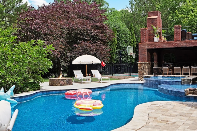 123 Trellingwood Dr, Morrisville, NC 27560 - view of pool featuring a patio and a pool with connected hot tub