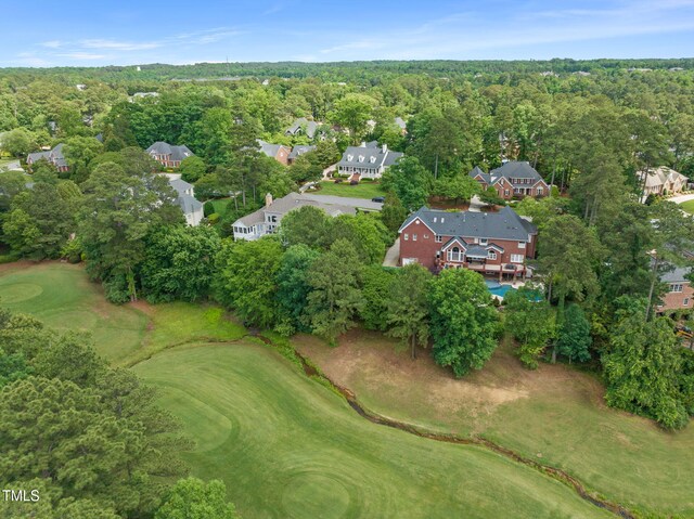 123 Trellingwood Dr, Morrisville, NC 27560 - aerial overview of property's location featuring a golf course, nearby suburban area, and a heavily wooded area